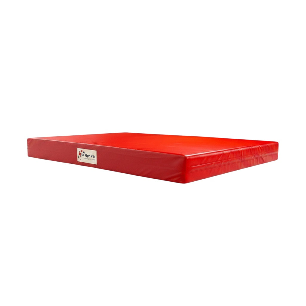 UK Gym Pits red crash mat for gymnastics and martial arts with heavy-duty PVC cover and anti-slip base