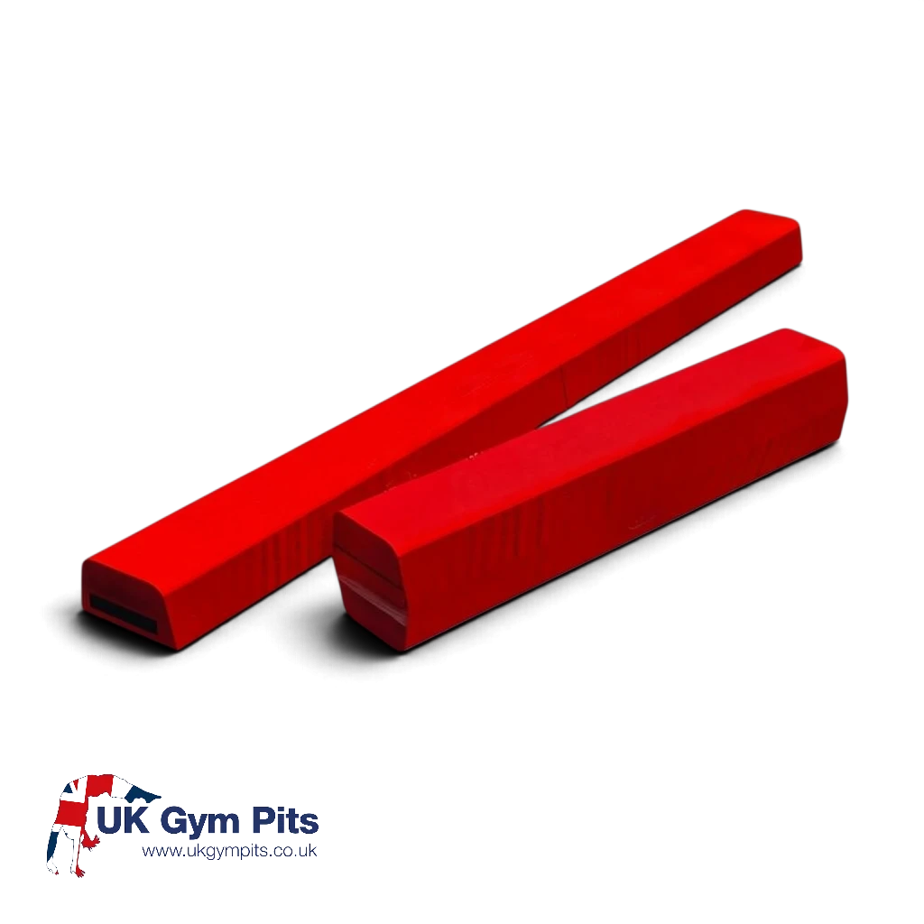 UK Gym Pits red folding foam balance beam for gymnastics practice with anti-slip base and Velcro connectors.