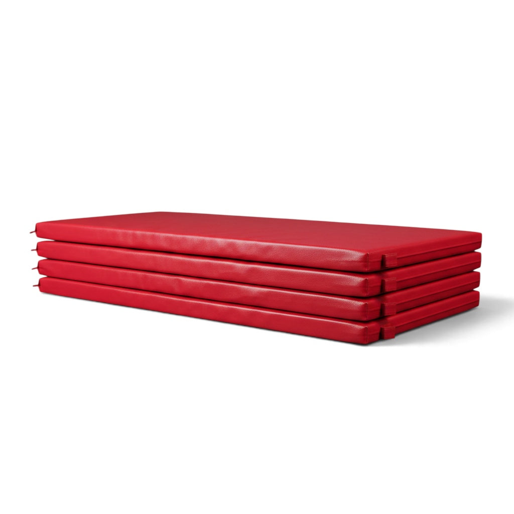 UK Gym Pits red padded vinyl skirts for gymnastics tracks, featuring durable 18oz vinyl and EVA foam for safety.