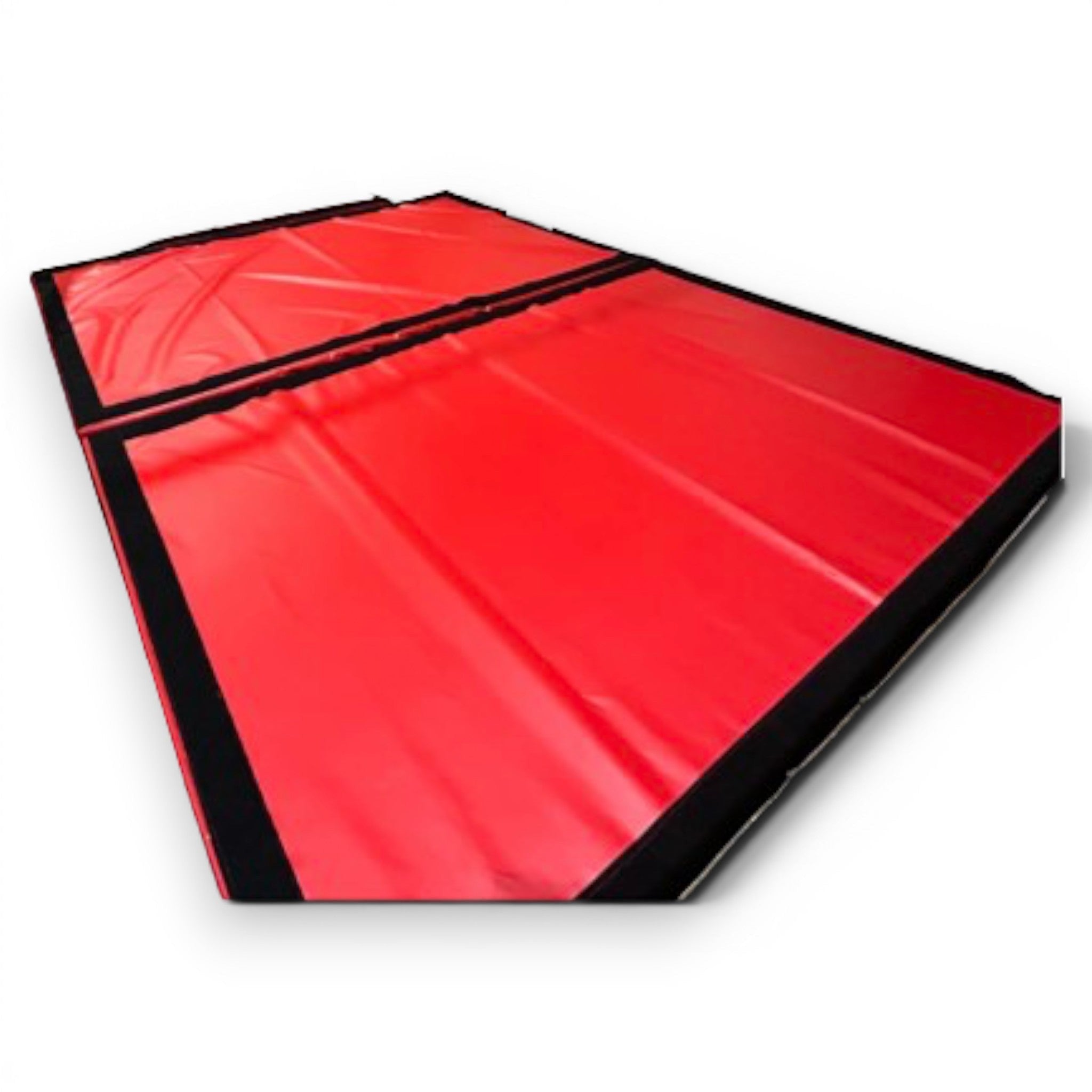 UK Gym Pits red PVC resi foam landing module with black trim for gymnastics and parkour landing areas.