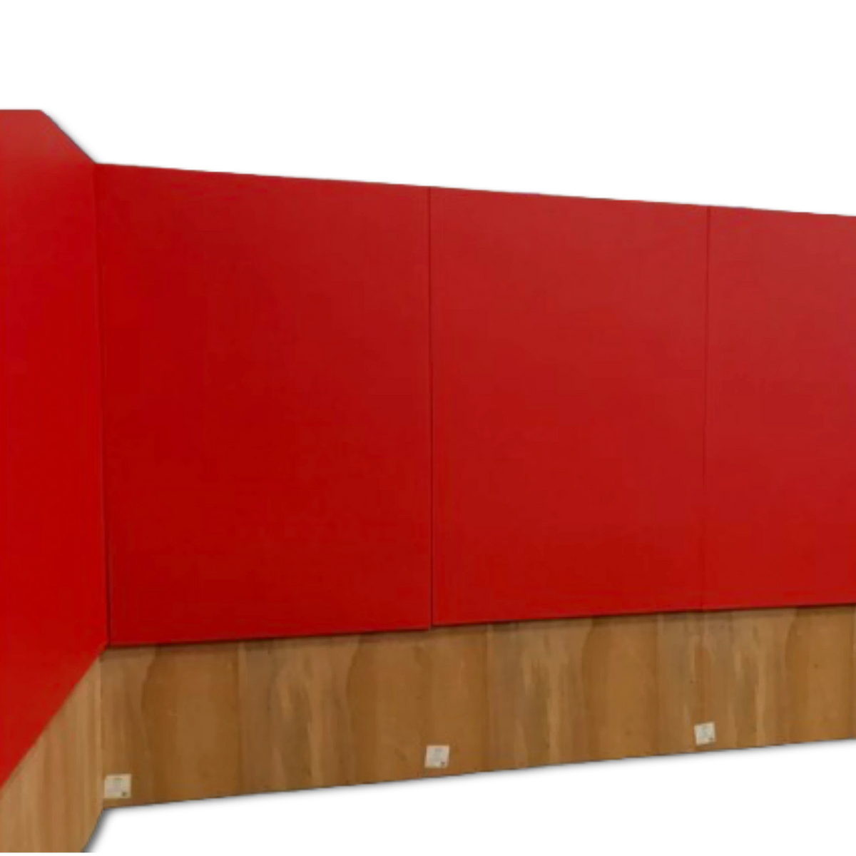 UK Gym Pits red safety wall padding panels installed on a wooden base for gym and sports facility wall protection.