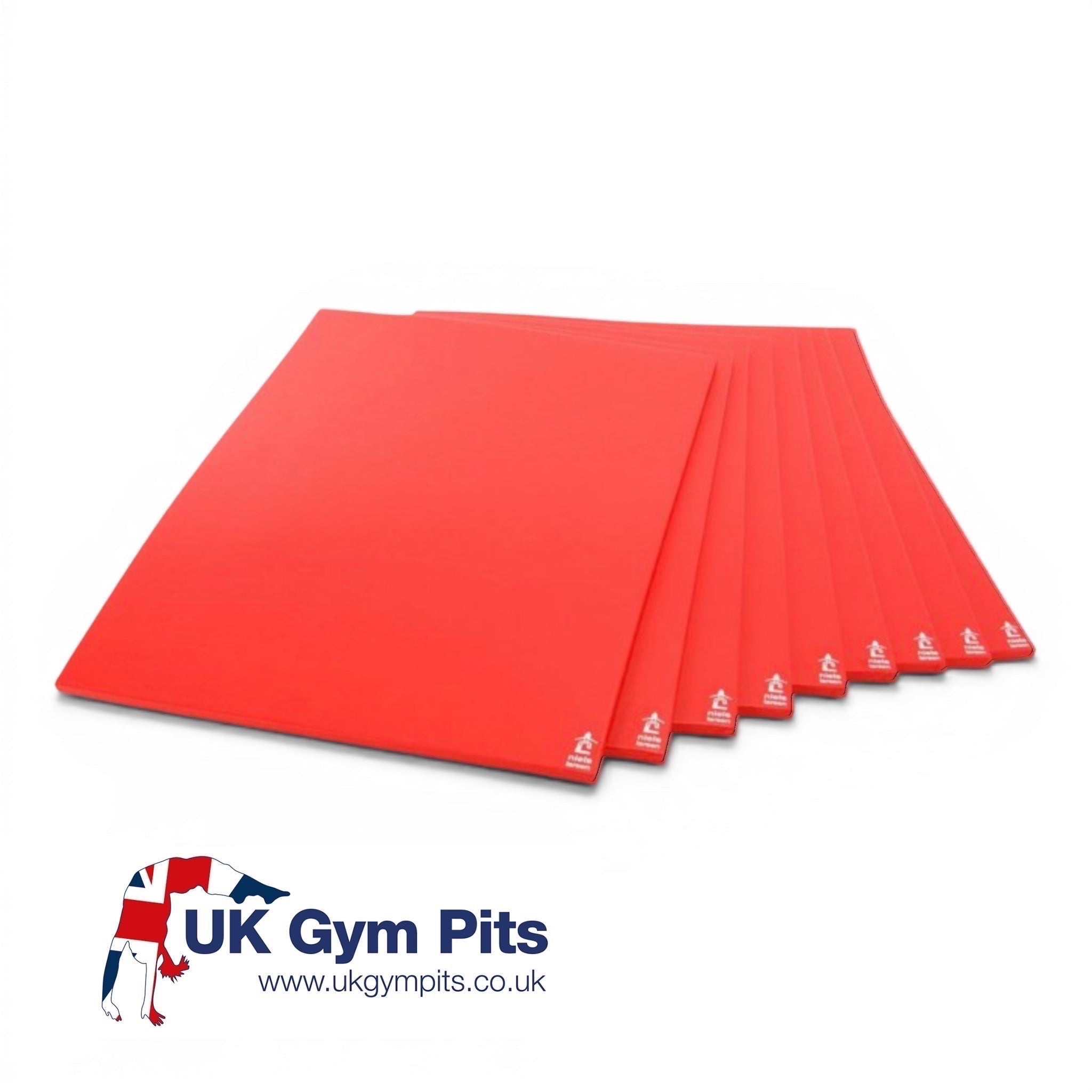UK Gym Pits red sandwich gym mats stacked together, featuring high-density foam and durable PVC fabric construction.