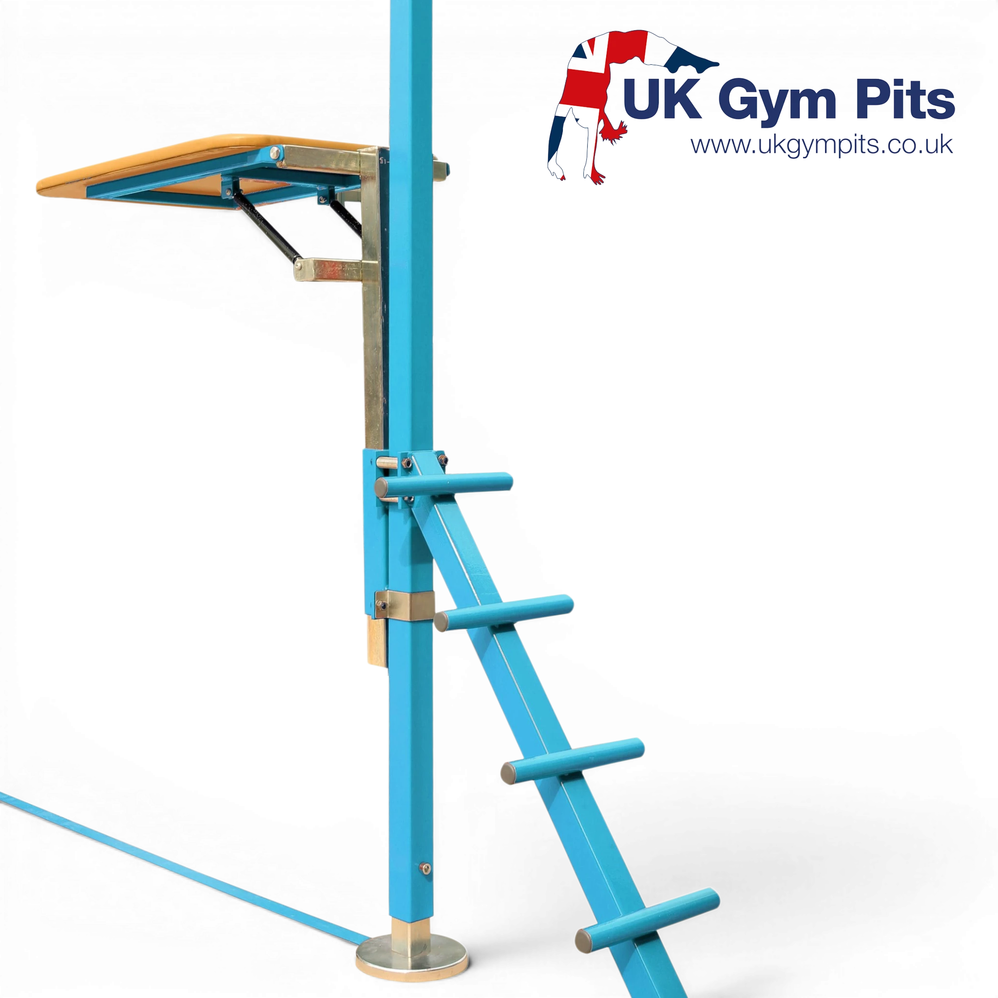 UK Gym Pits ring frame spotting platform with blue steel frame, wooden platform, and access ladder for gymnastics.