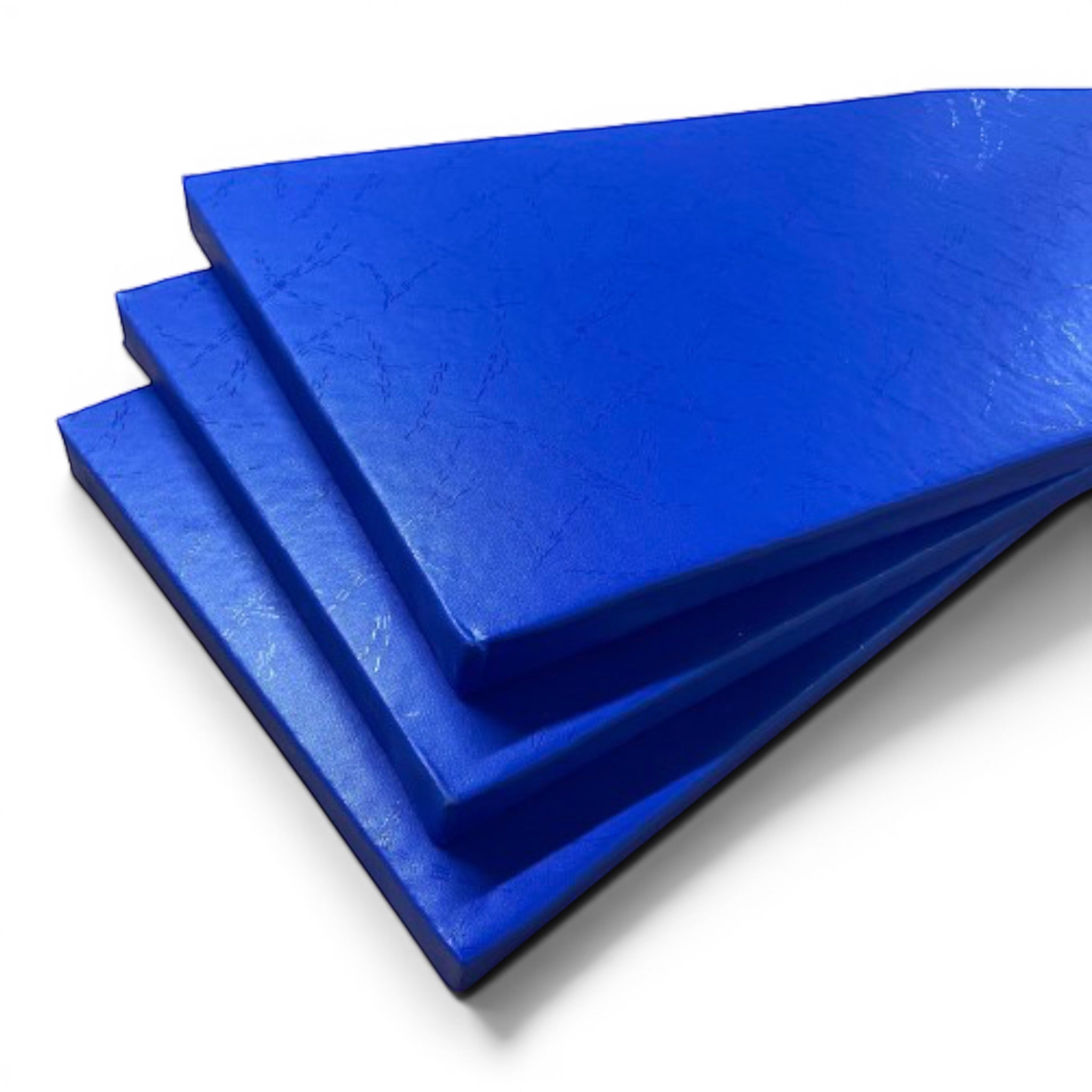 UK Gym Pits royal blue shock-absorbing foam padding sheets with heavy-duty PVC cover for gym walls and pits.