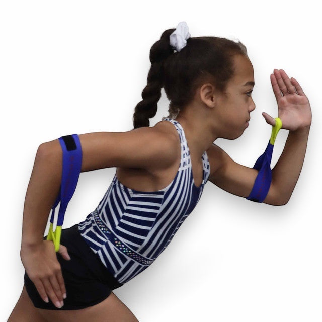 Young athlete wearing UK Gym Pits running resistance bands to maintain 90-degree arm form during training