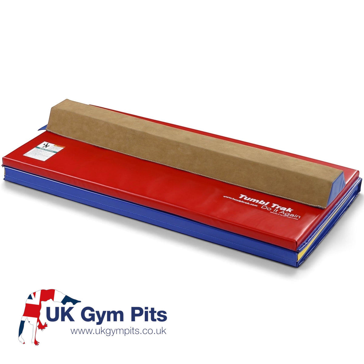 UK Gym Pits sectional balance beam with suede top on a red and blue folding vinyl tumbling mat for gymnastics training.