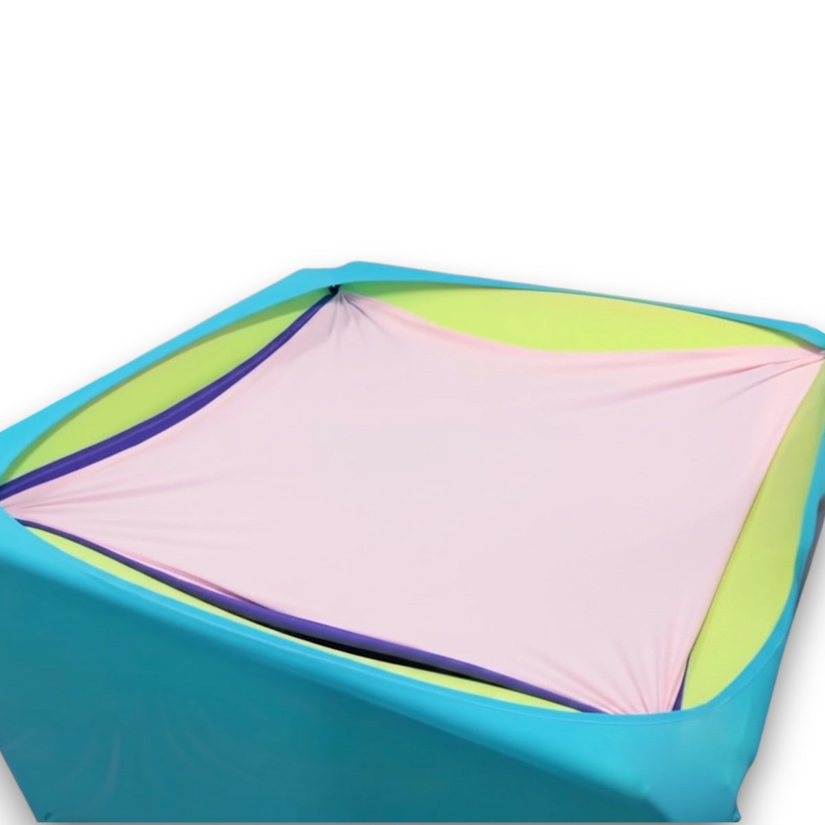 UK Gym Pits Sensory Boundex Cuddle box with layered pink, green, and blue lycra fabric for sensory motor play.