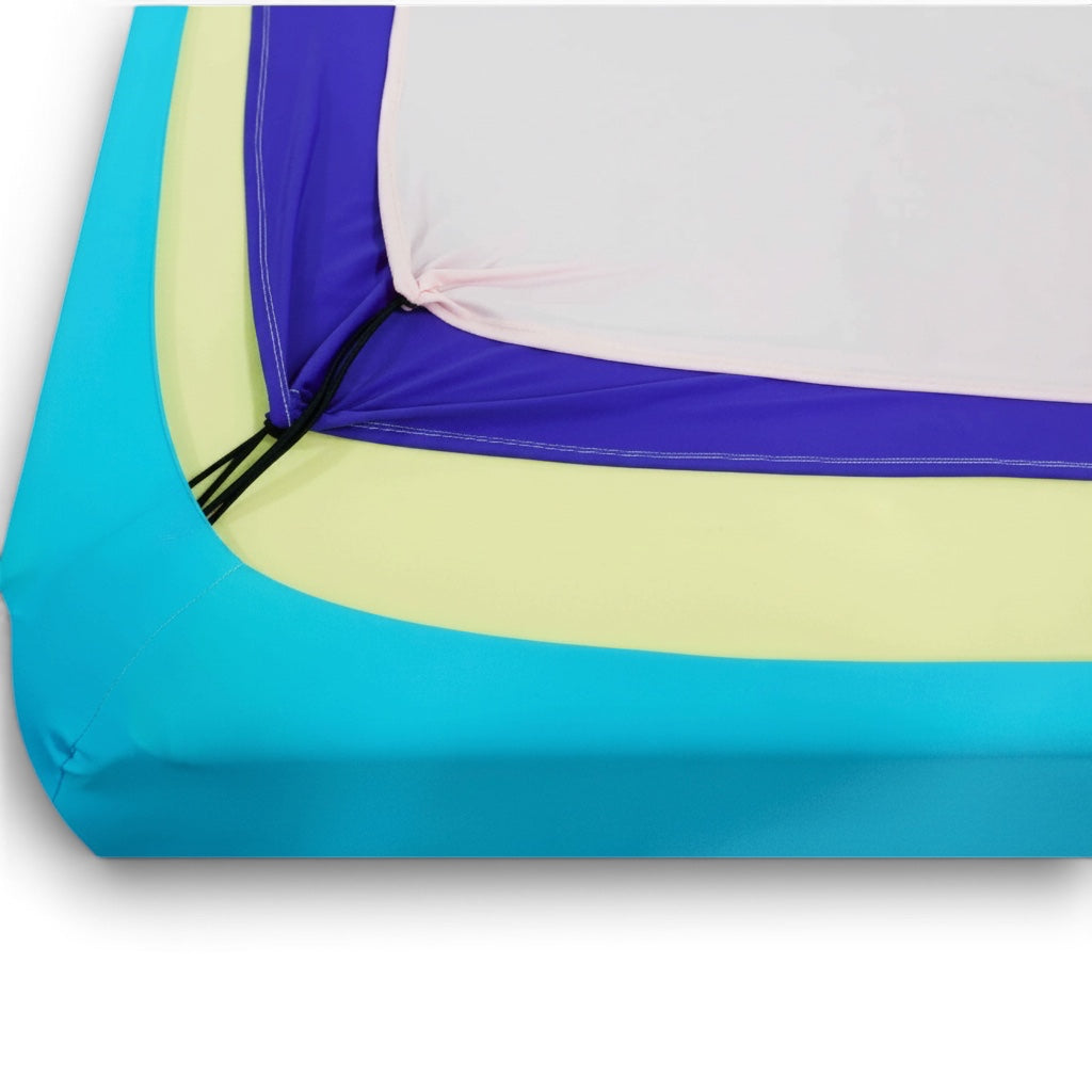 UK Gym Pits Sensory Boundex Cuddle box featuring layered blue, yellow, and white lycra fabric for sensory play