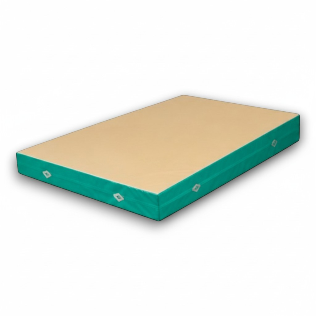 UK Gym Pits FIG approved soft topper landing mat with a beige jersey top and green PVC sides for gymnastics training.