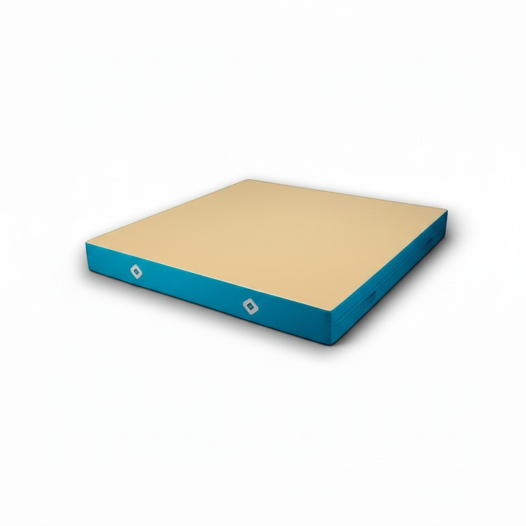 UK Gym Pits FIG approved soft topper landing mat with a beige jersey top and blue PVC sides for gymnastics training.