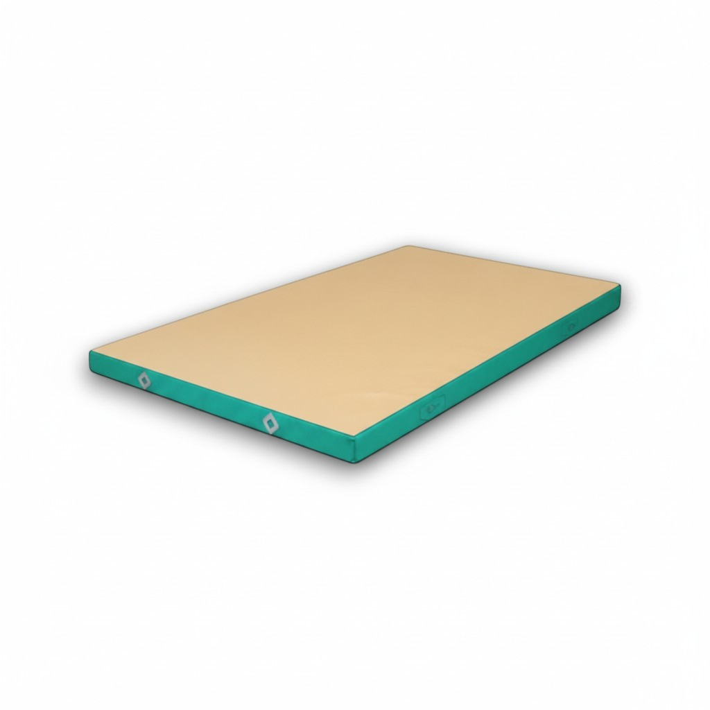 UK Gym Pits FIG approved soft topper landing mat with beige jersey top and teal PVC sides for gymnastics training