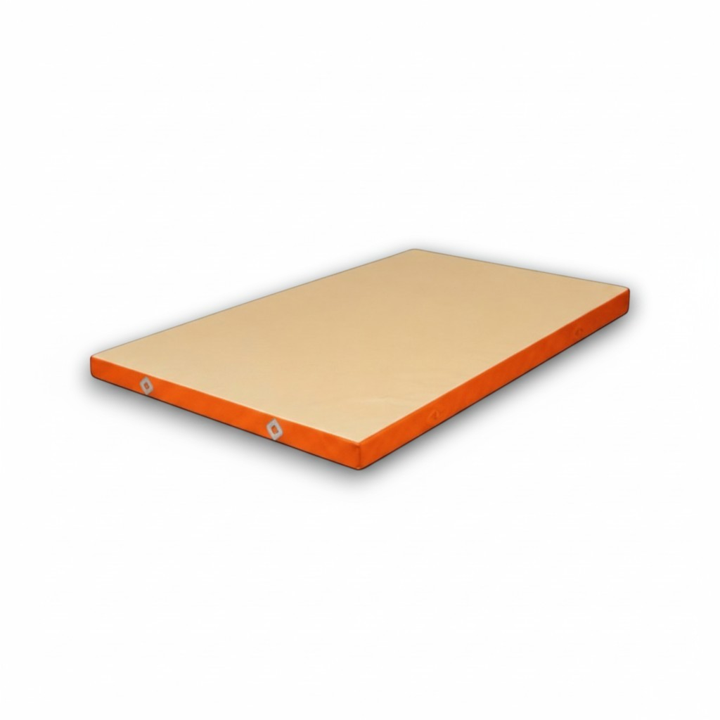 UK Gym Pits FIG approved soft topper gymnastics landing mat with a beige jersey top and orange PVC sides.
