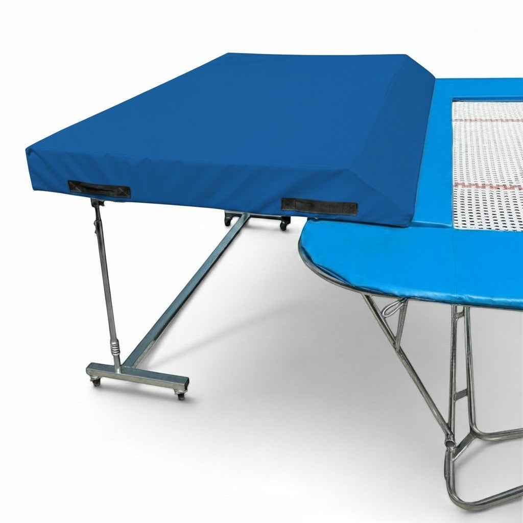 UK Gym Pits international spotting end deck with a blue wedged safety mat attached to a trampoline frame.