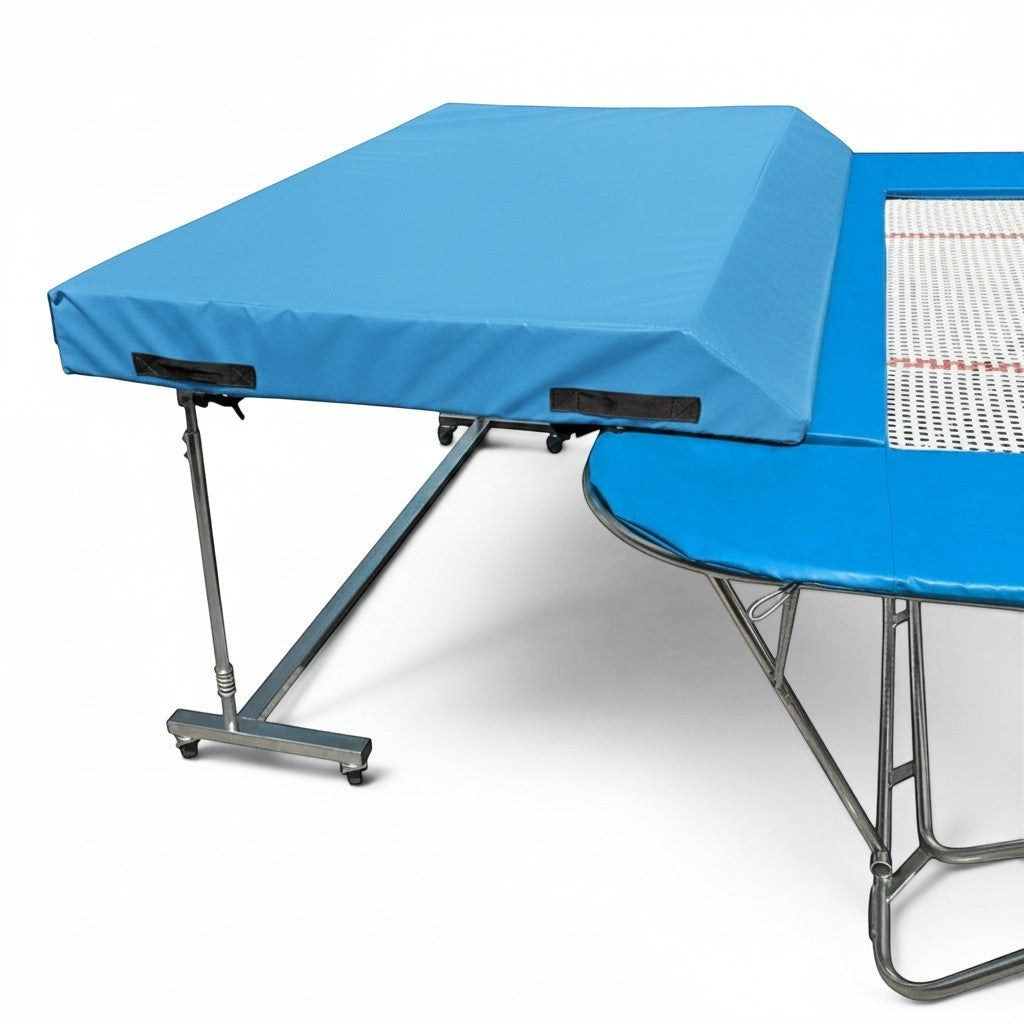 UK Gym Pits standard spotting end deck with blue wedged safety mat attached to a trampoline frame