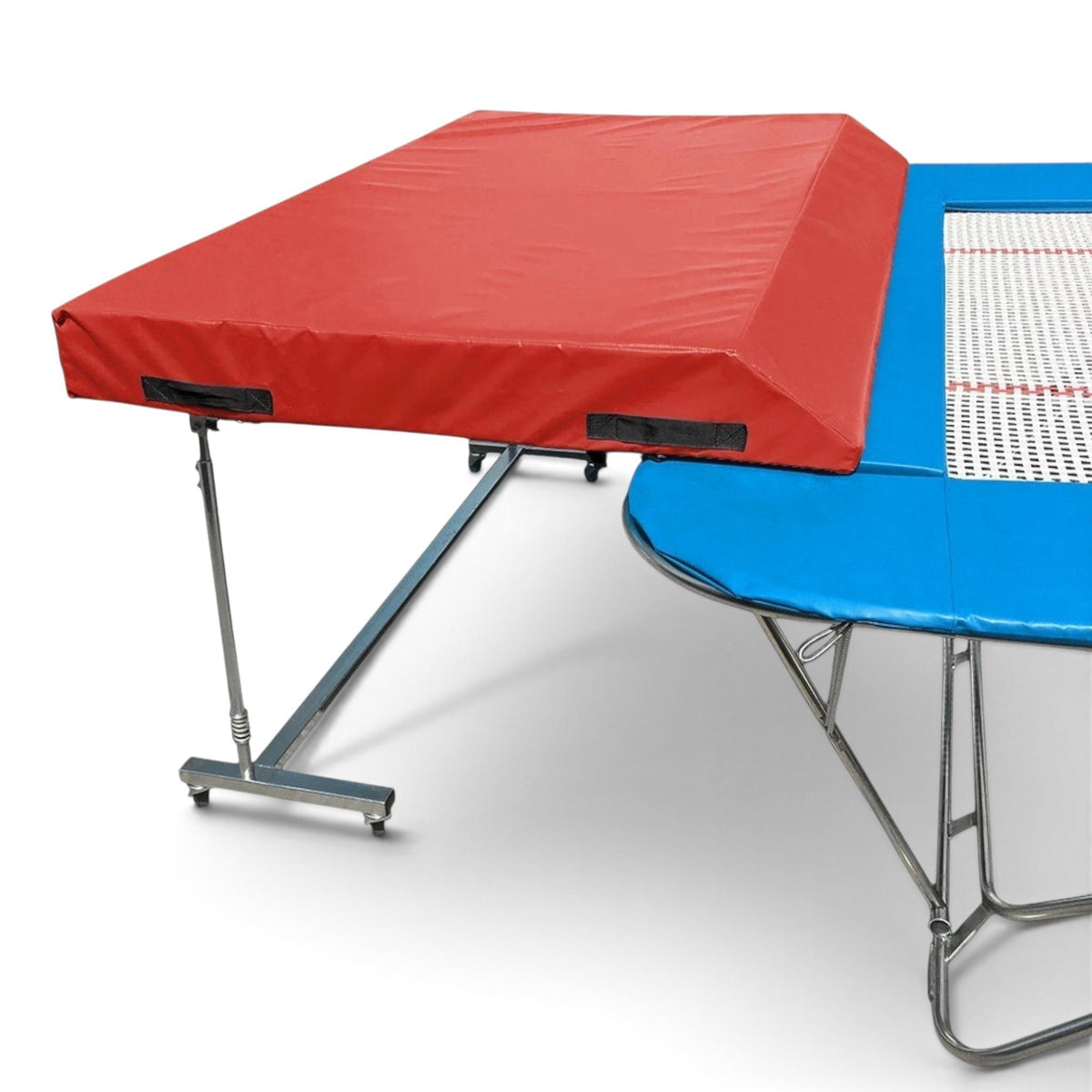 UK Gym Pits international spotting end deck with red wedged safety mat attached to a trampoline frame
