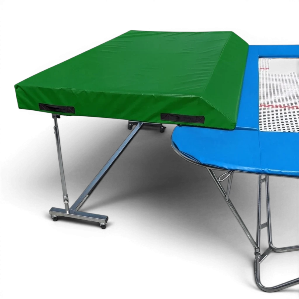 UK Gym Pits international spotting end deck with green wedged safety mat attached to a trampoline frame