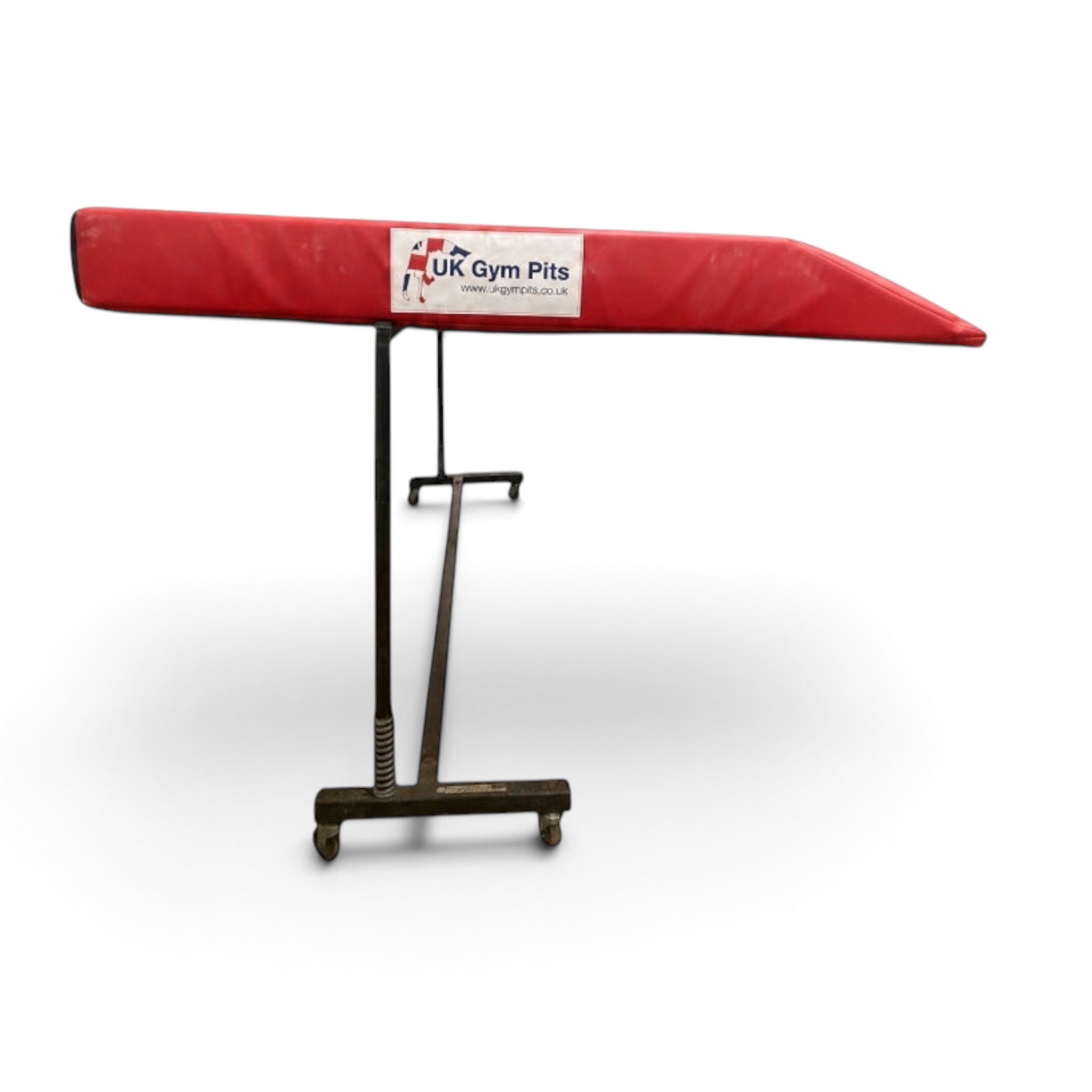 UK Gym Pits Continental international spotting end deck with red padded surface and black adjustable folding frame.