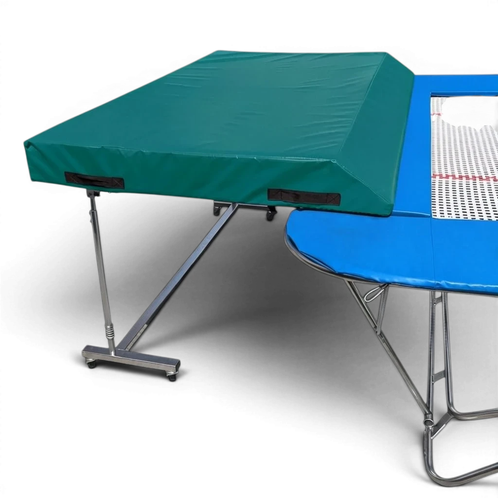 UK Gym Pits international spotting end deck with green wedged safety mat attached to a trampoline frame