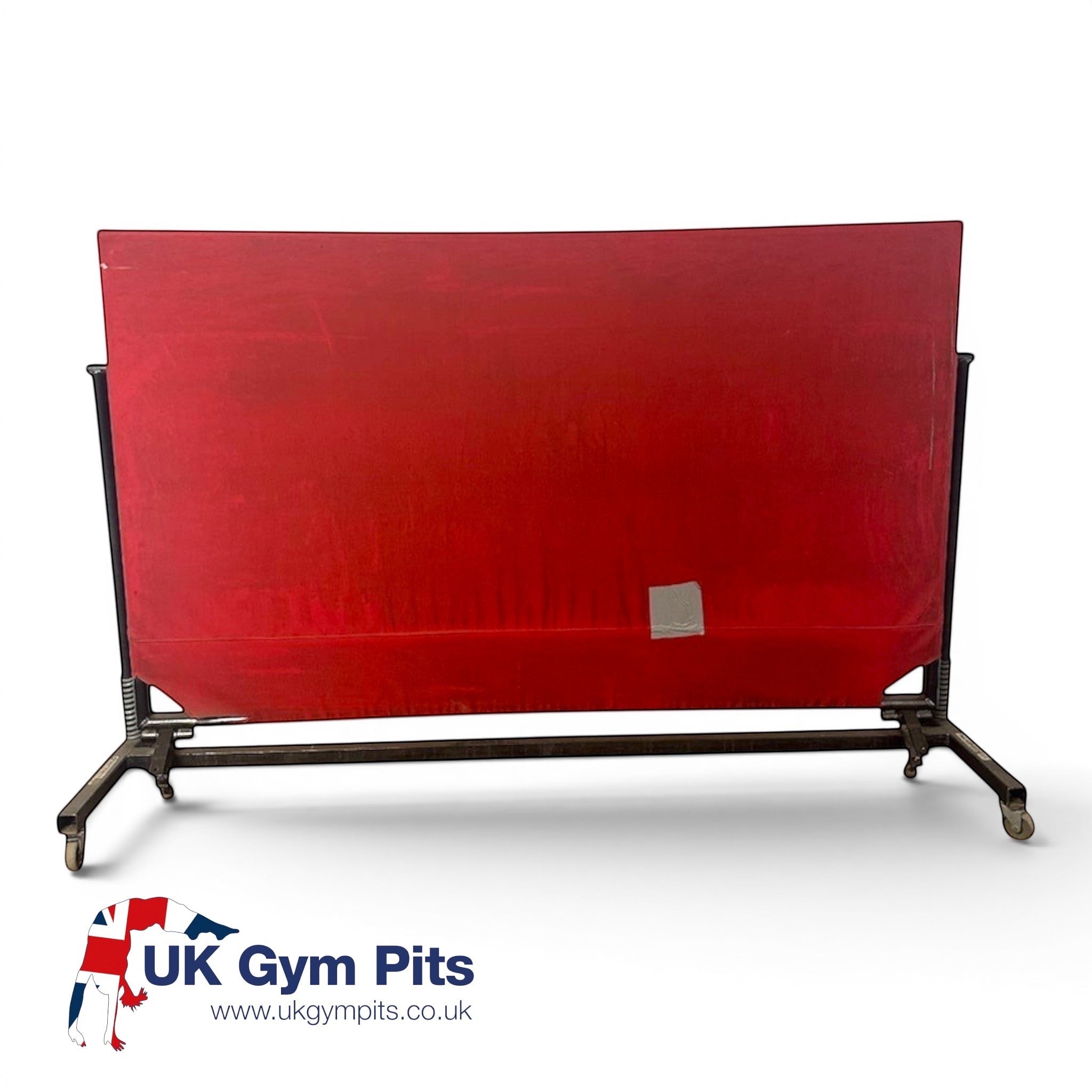 UK Gym Pits Continental International spotting end deck with a red padded surface and black folding frame on wheels.