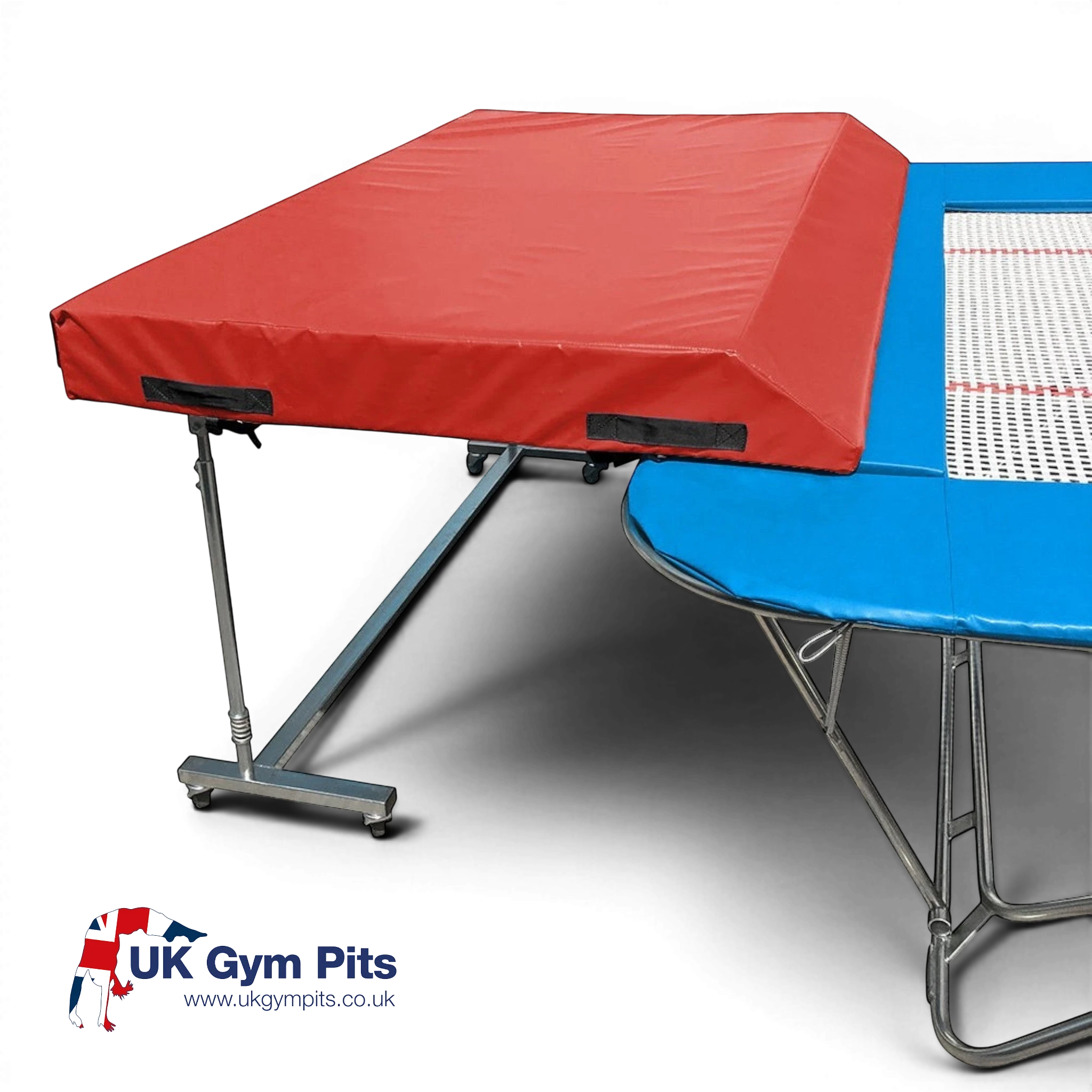 UK Gym Pits standard spotting end deck with a red wedged safety mat attached to a trampoline frame