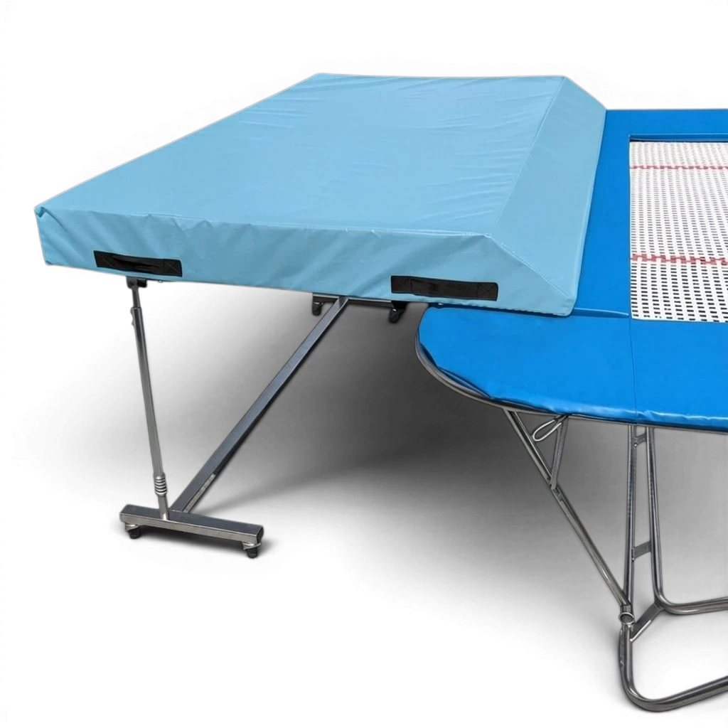 UK Gym Pits international spotting end deck with a light blue safety mat attached to a trampoline frame.