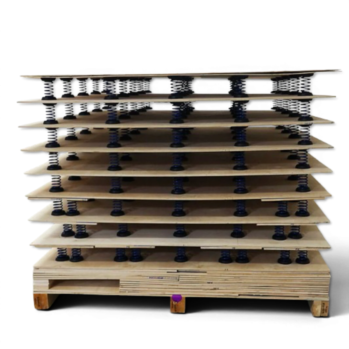 UK Gym Pits stack of plywood sheets with pre-installed high carbon steel power springs for a cheerleading sprung floor.