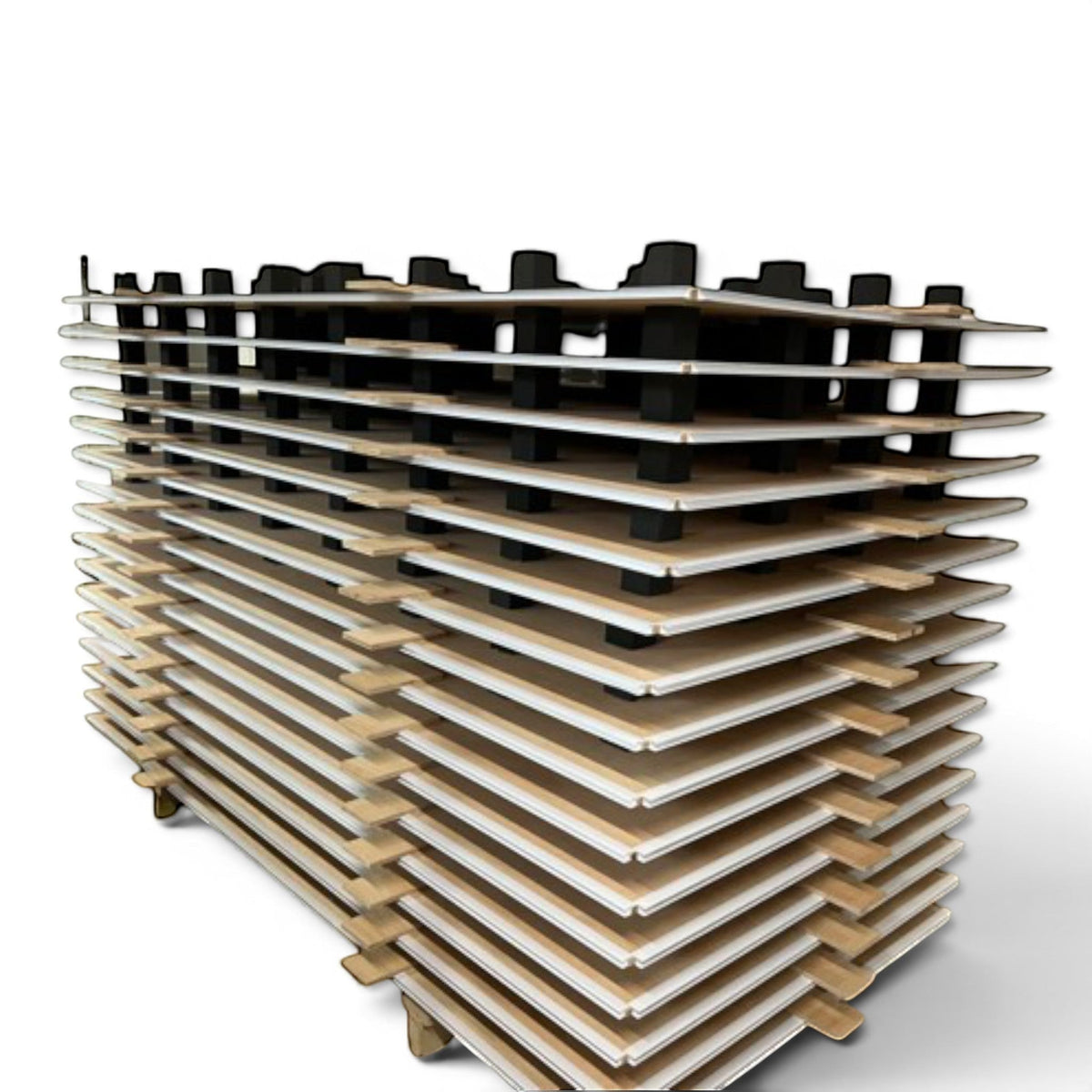 UK Gym Pits sprung tumble floor components showing stacked dual plywood sheets with pre-installed EDPM foam blocks.