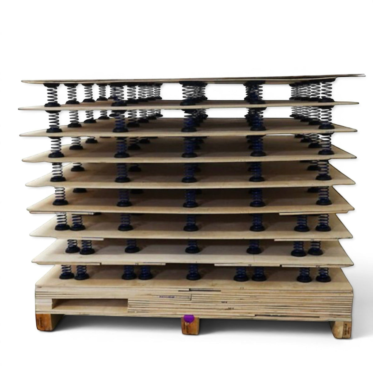 UK Gym Pits sprung tumble floor showing stacked plywood sheets with integrated high carbon steel power springs
