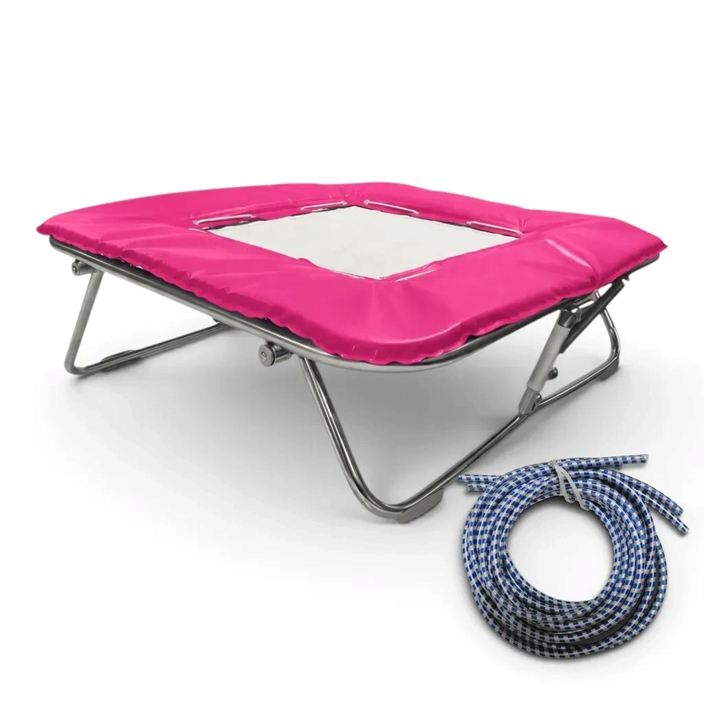 UK Gym Pits super mini trampoline with a solid super-mesh bed, pink frame pads, and blue rubber tension cables.