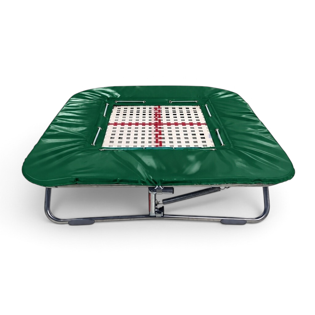 UK Gym Pits super mini tramp with a 25mm web bed and green protective frame pads on a zinc plated steel frame.