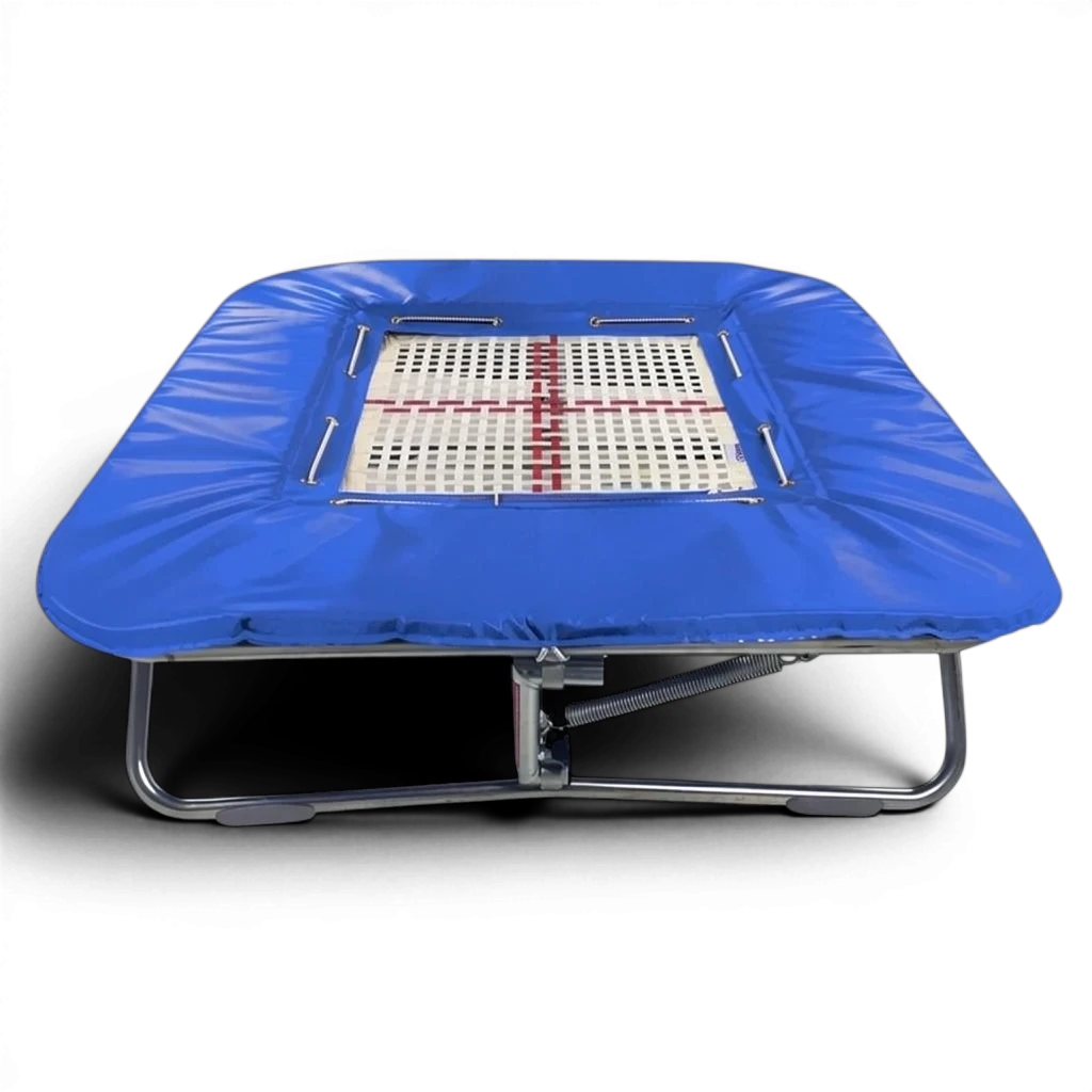 UK Gym Pits super mini trampoline with blue frame pads and a white web bed on a black background