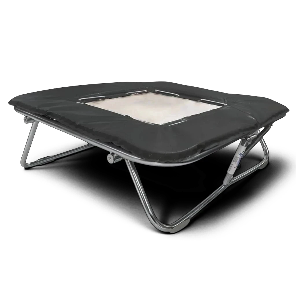 UK Gym Pits super mini trampoline with a solid super-mesh bed, zinc-plated frame, and black protective padding.