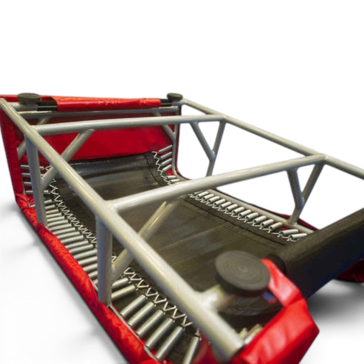 UK Gym Pits T-Trainer gymnastics vault training equipment showing the metal frame, springs, and black Xtreme bed.