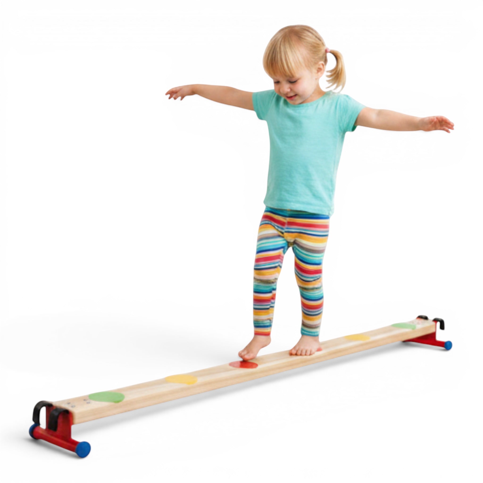 Young girl balancing on a UK Gym Pits natural timber balance beam with colourful spots and red metal support feet.