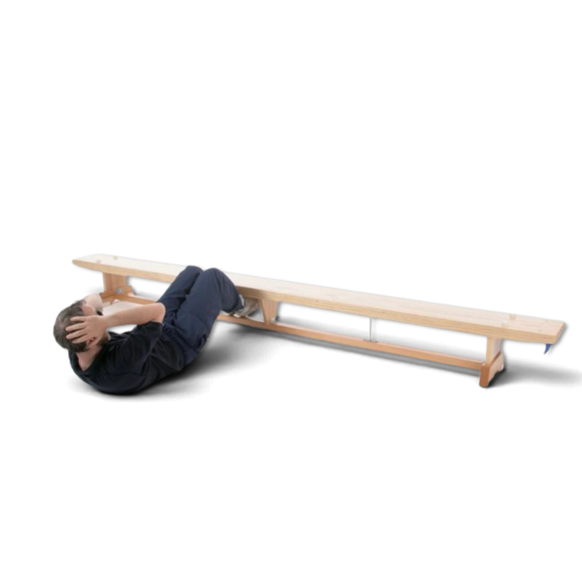 UK Gym Pits traditional wooden balance bench being used by a man for sit-ups in a gym setting