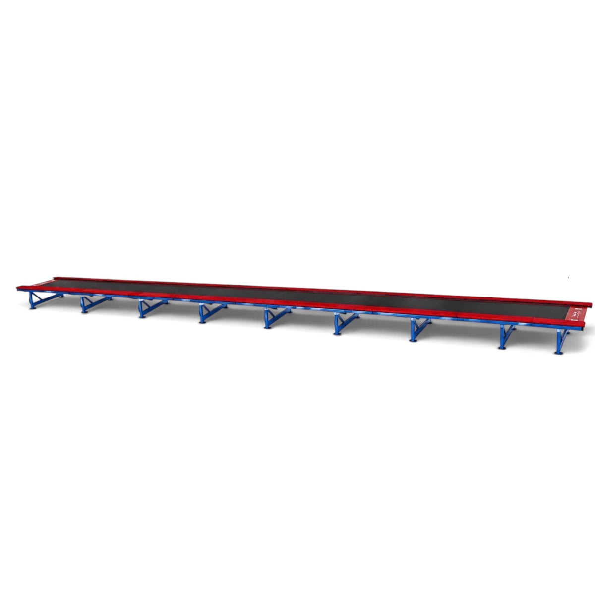 UK Gym Pits Tumbl Trak gymnastics training track with a black bed, red safety pads, and a royal blue steel frame.