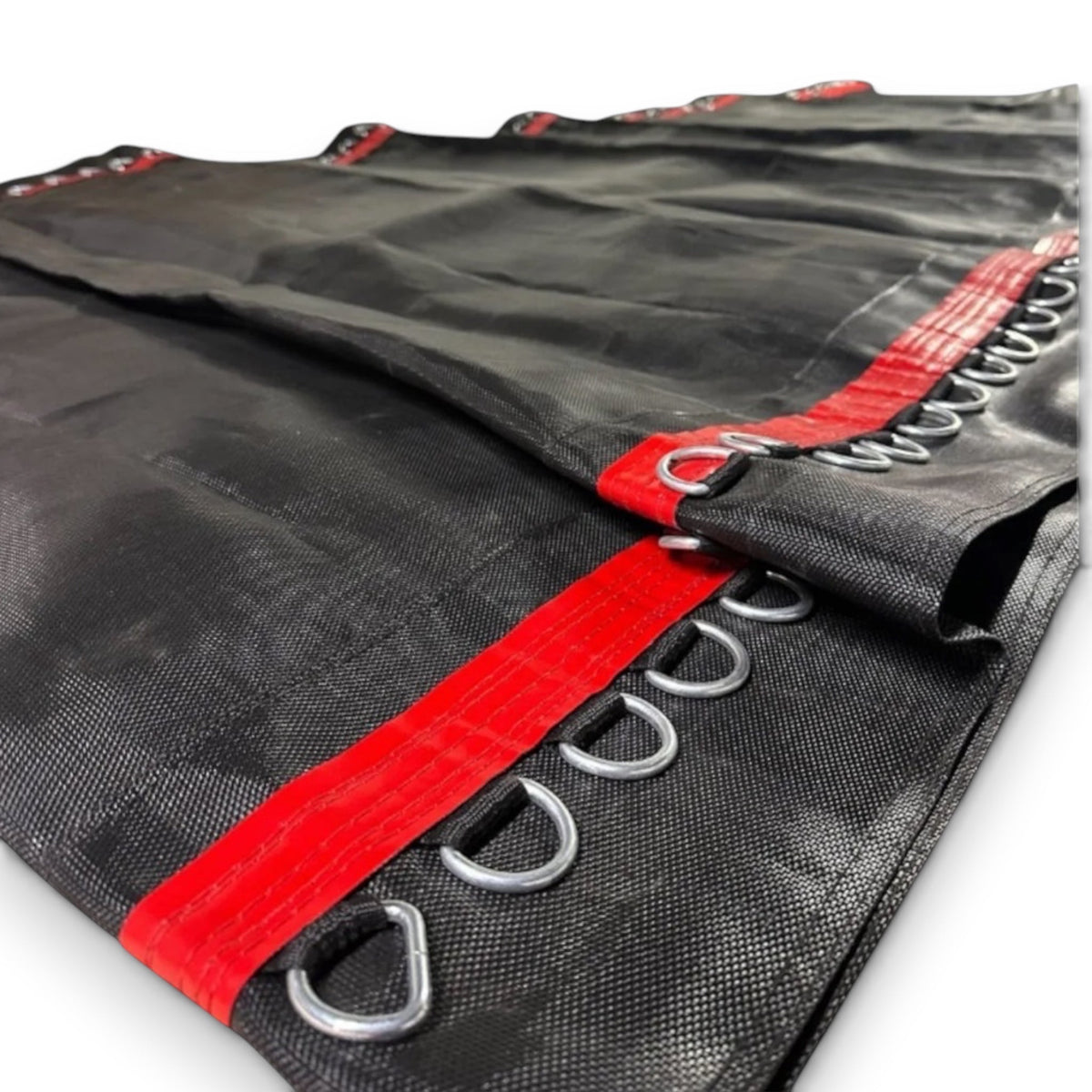 UK Gym Pits black replacement bed for Tumbl Trak featuring durable mesh material and red reinforced spring loops
