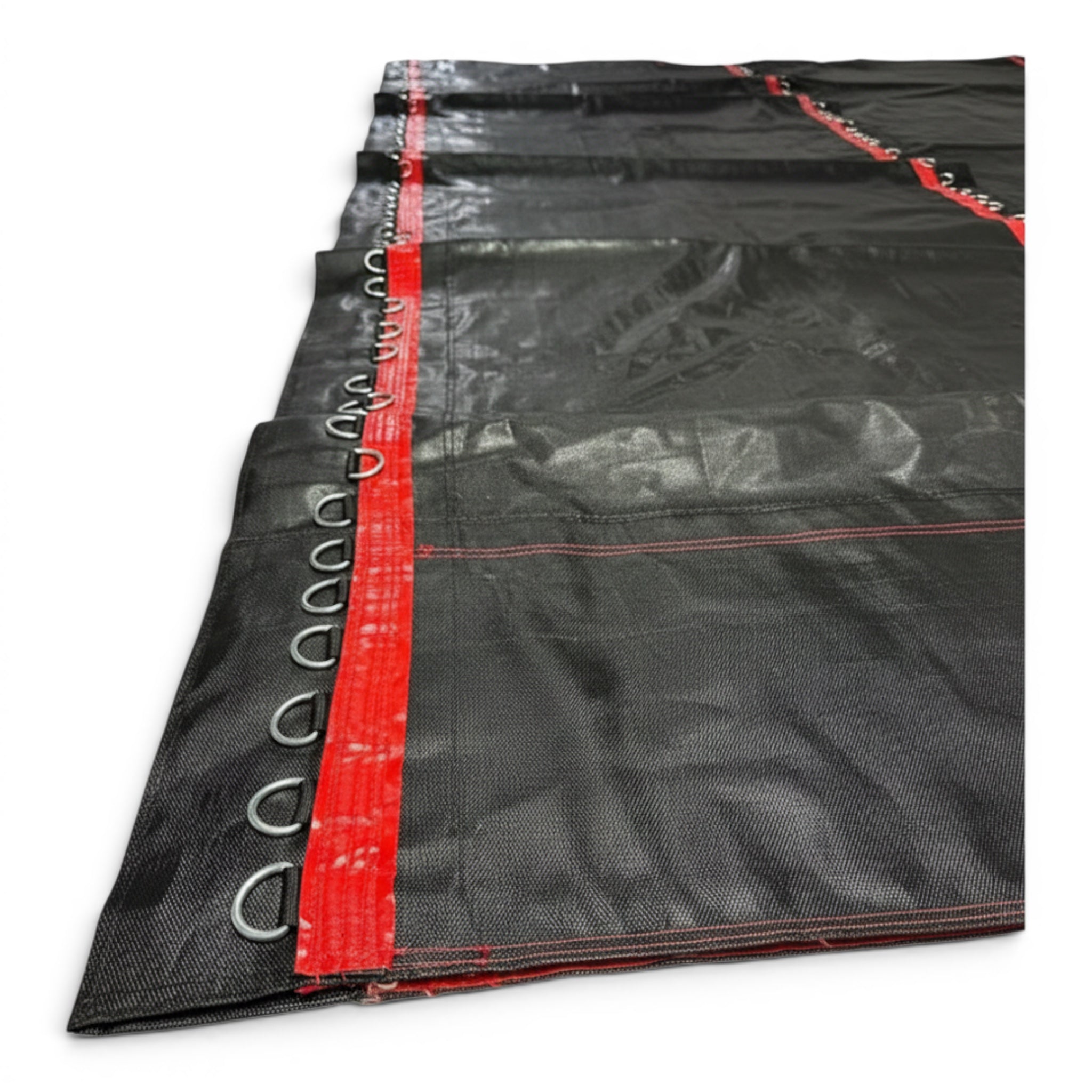 UK Gym Pits 9 metre black Tumbl Trak replacement bed with red reinforced edges and metal D-ring attachments.