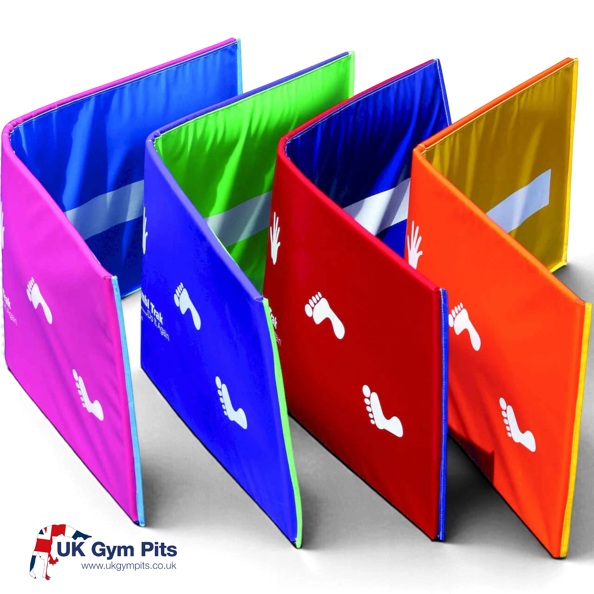 UK Gym Pits colourful tumbling mats with white beam stripes and hand and foot placement guides for gymnastics training.