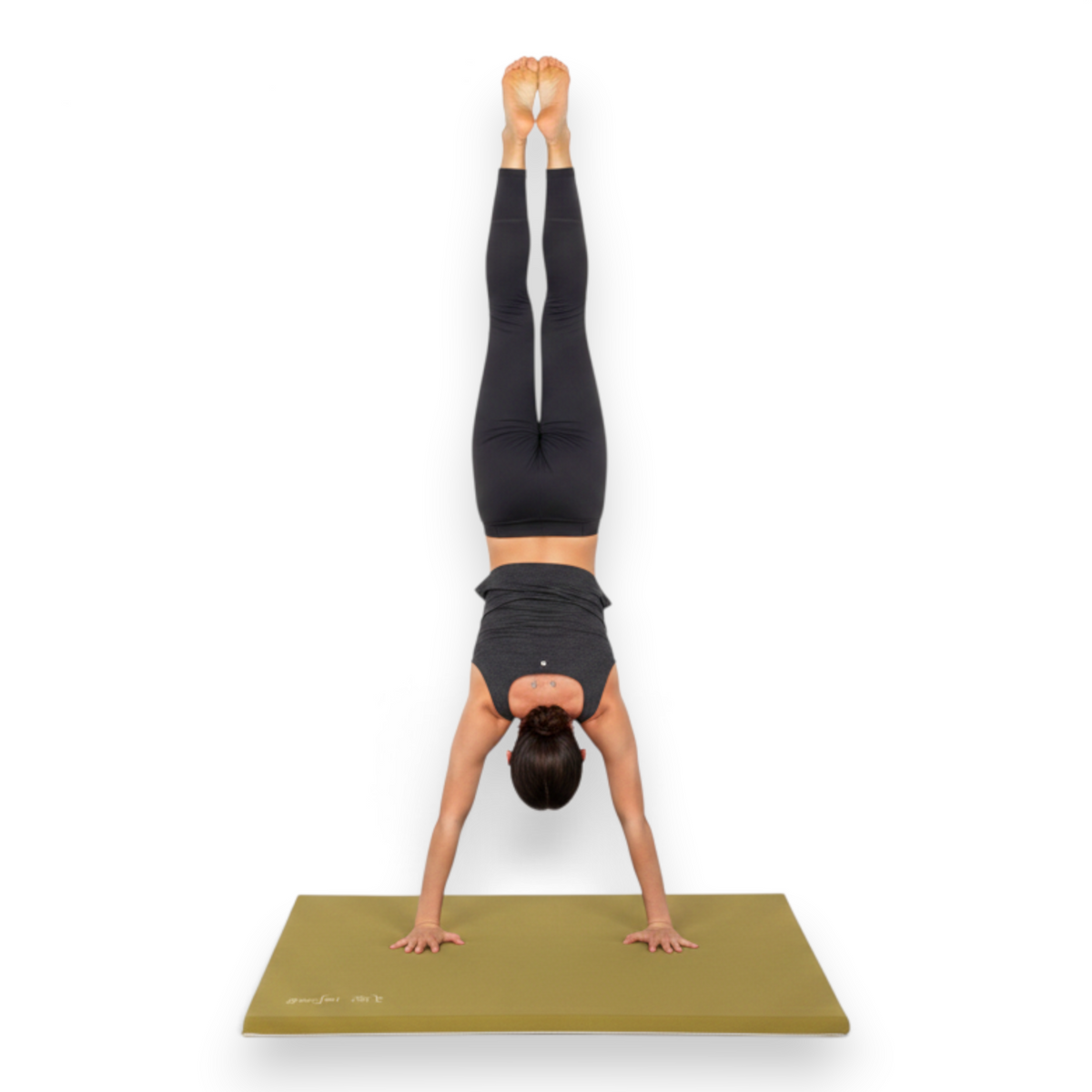 Gymnast performing a handstand on a UK Gym Pits Gaofei vault round off mat with soft jersey fabric and foam padding