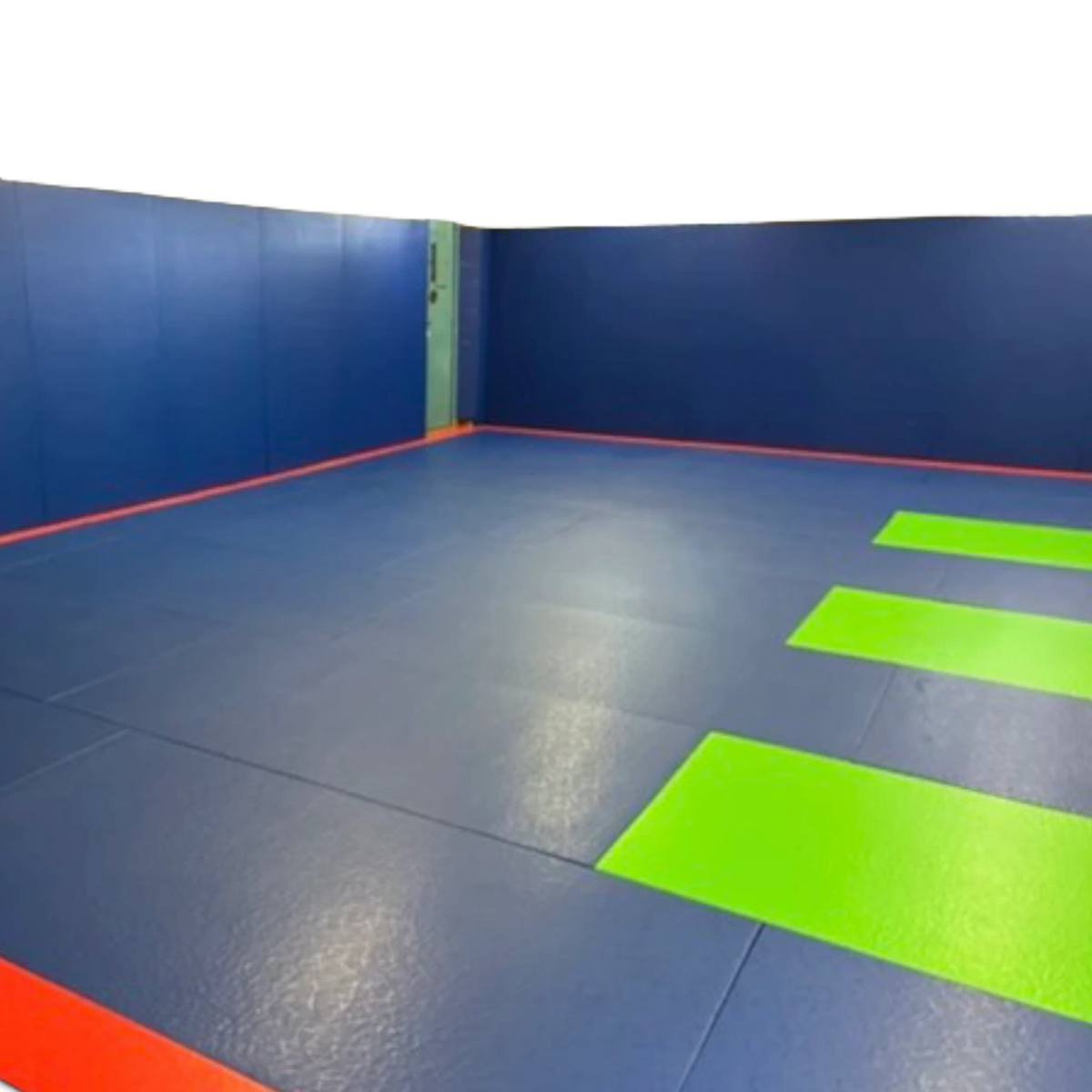 UK Gym Pits wall pads and floor mats in blue and bright green PVC for a gymnastics or martial arts training facility.