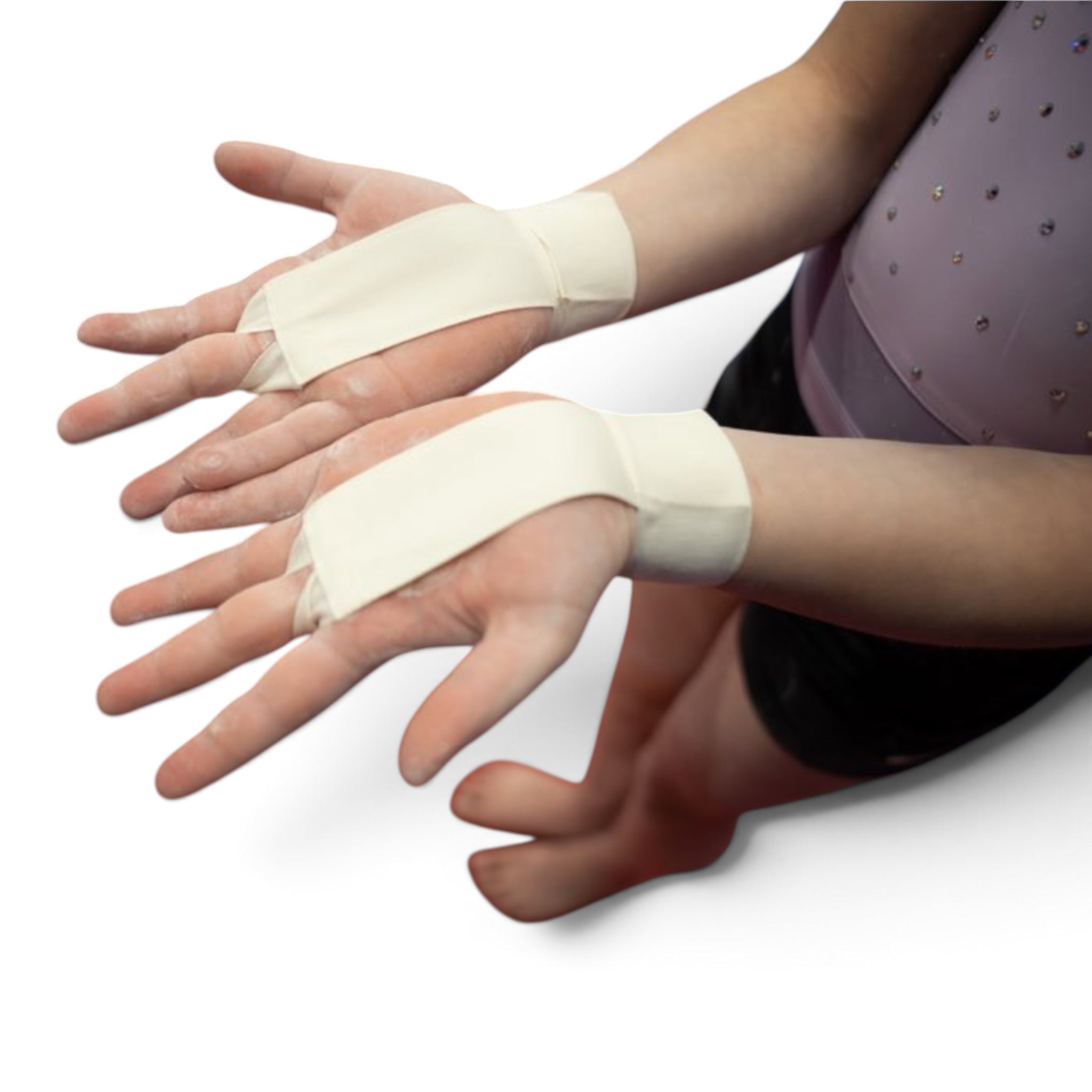 UK Gym Pits white cotton tape grips worn on a gymnast's hands to provide protection and reduce skin irritation.