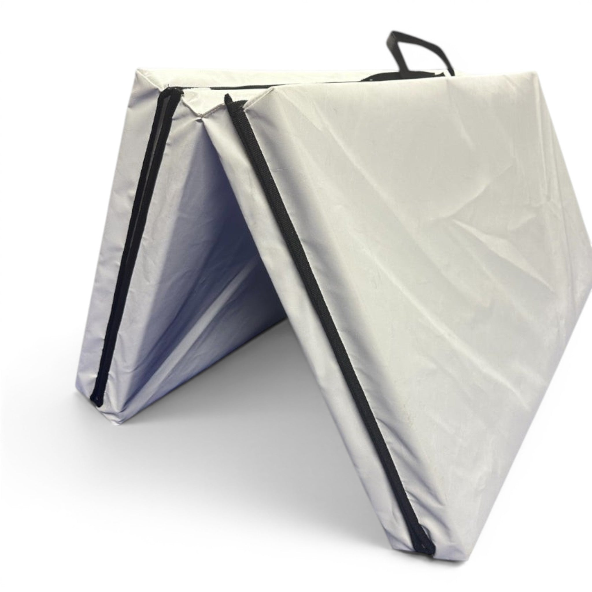 UK Gym Pits white foldable gymnastics mat made of durable PVC with a carry handle for easy transport.