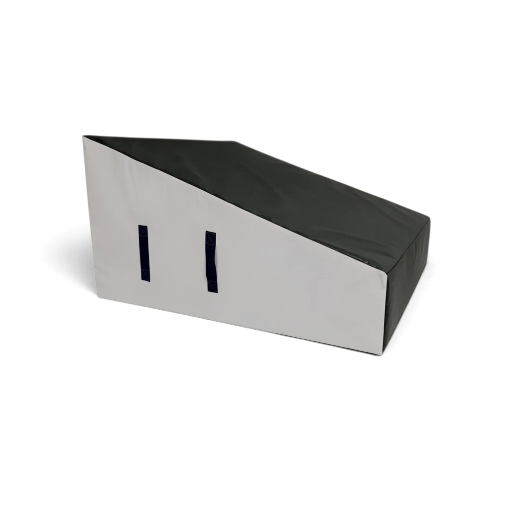 UK Gym Pits wide parkour wedge block with black top and white sides, featuring carry handles for freestyle training.