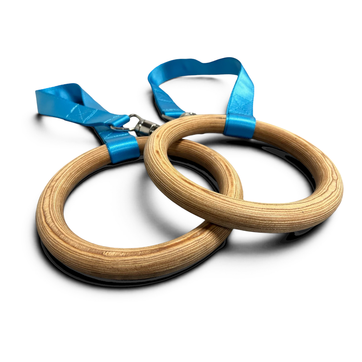 UK Gym Pits Gaofei wooden gymnastics training rings with bright blue nylon straps against a black background.