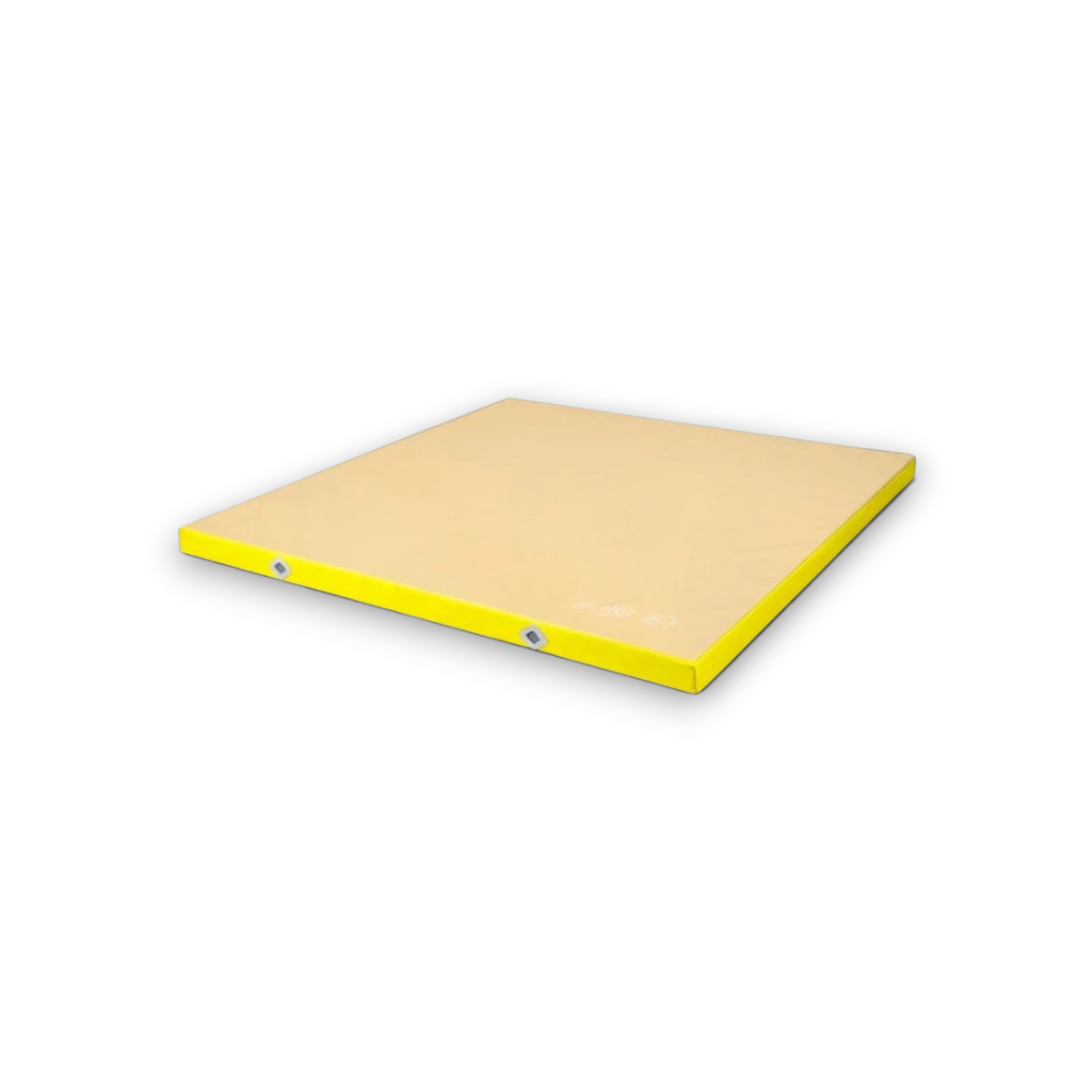 UK Gym Pits FIG approved yellow soft topper gymnastics landing mat with a non-slip base and air distribution mesh.
